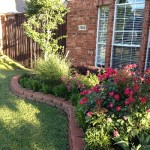 Flowers in Bed with Trees Front Yard